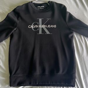 Black long sleeve Calvin Klein sweater (Mens medium)